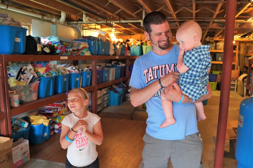 Alex Grimes with two of his children