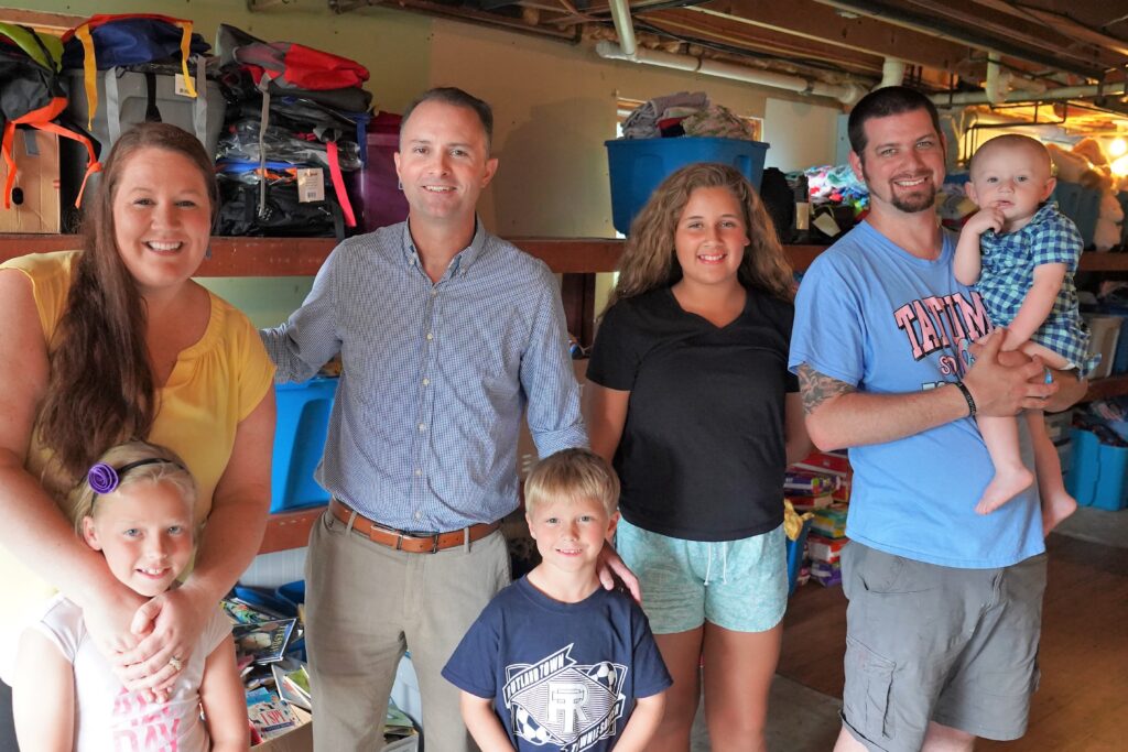 TJ Donovan with Alex and Elizabeth Grimes and their children