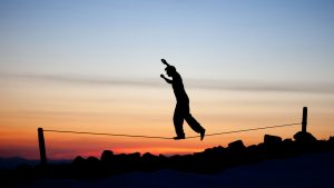 Person Balancing on Wire