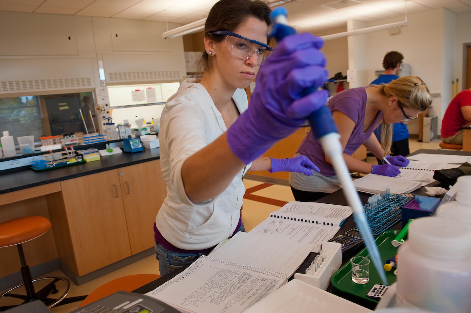 Student in the biochemistry lab, Jeffords Hall