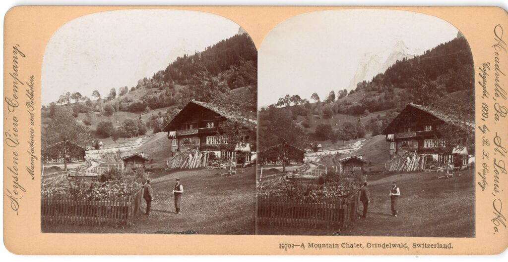 Two photographs mounted side by side on a tan card showing two men in front of an inn on the side of a hill.