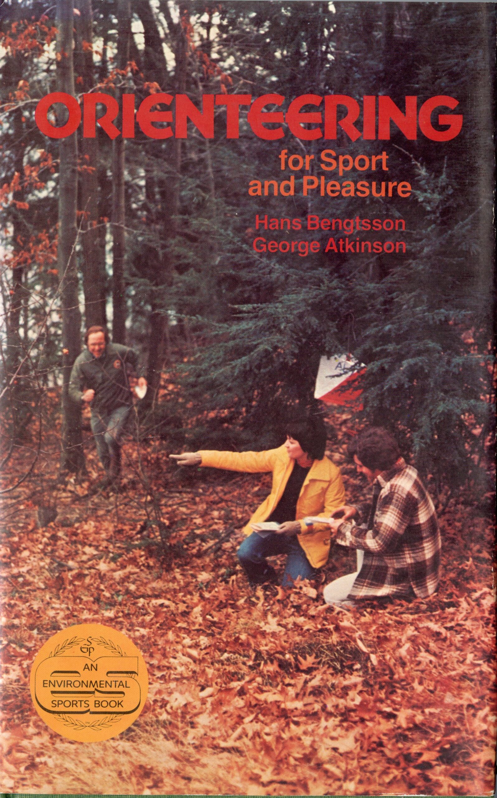 Cover of a book with the title, Orienting for Sport and Pleasure, and the authors' names, Hans Bengtsson and George Atkinson, on a colored photos of three people in the woods holding maps and pointing. 