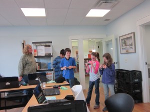 Tech Wizard participants at the Fairfield Library prepare for a photography scavenger hunt.