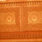 Carved cedar detail inside retractable portion of roof