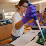 Student in the biochemistry lab, Jeffords Hall